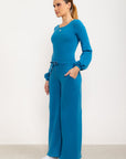 Calça flare Entusiasmo de cintura alta com bolsos laterais e tecido tecnológico - Azul Cobalto ROWA DROP2