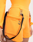Shorts Autocuidado com bolsa e tecido tecnológico - Laranja Citrus