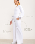 Calça flare Entusiasmo de cintura alta com bolsos laterais e tecido tecnológico - Branco ROWA DROP2