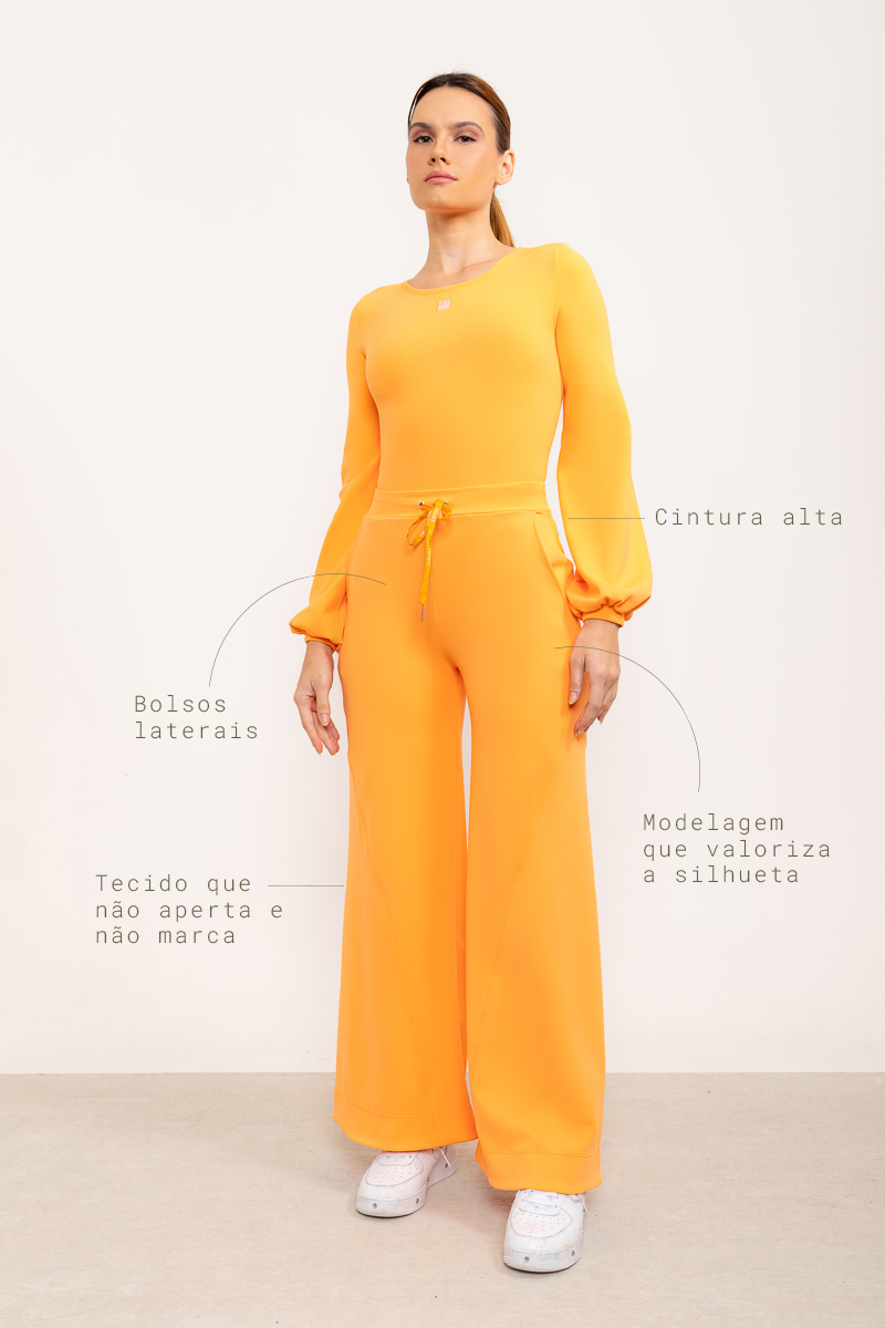 Calça flare Entusiasmo de cintura alta com bolsos laterais e tecido tecnológico - Laranja Citrus ROWA DROP2